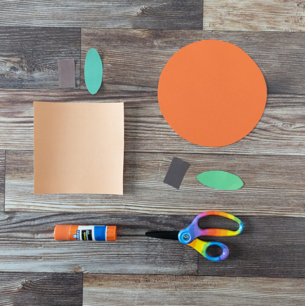 Pieces cut out to make square and circle shaped pumpkins.