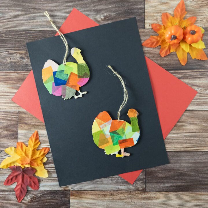 Tissue paper painted turkey cutouts with twine to hang them up.