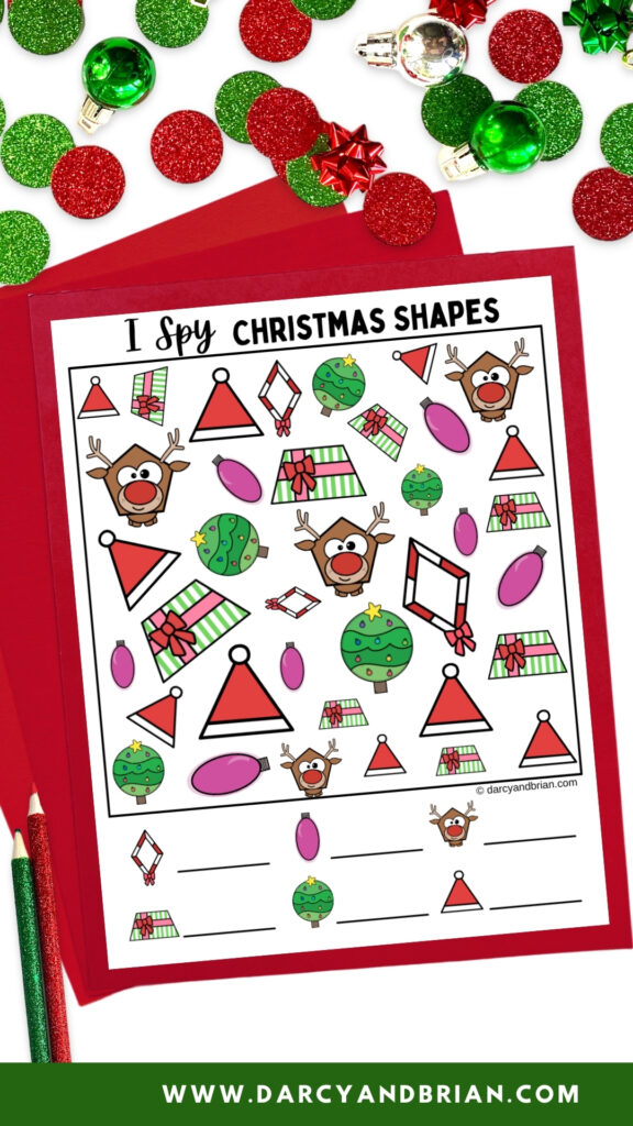 Digital mockup of I Spy Christmas Shapes worksheet on top of red construction paper. Christmas confetti and small ornaments along the top.