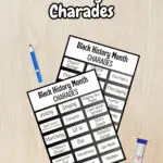 Black and white text at the top says Black History Month Charades. Below that is a digital preview of two pages of charades cards on a desk background.