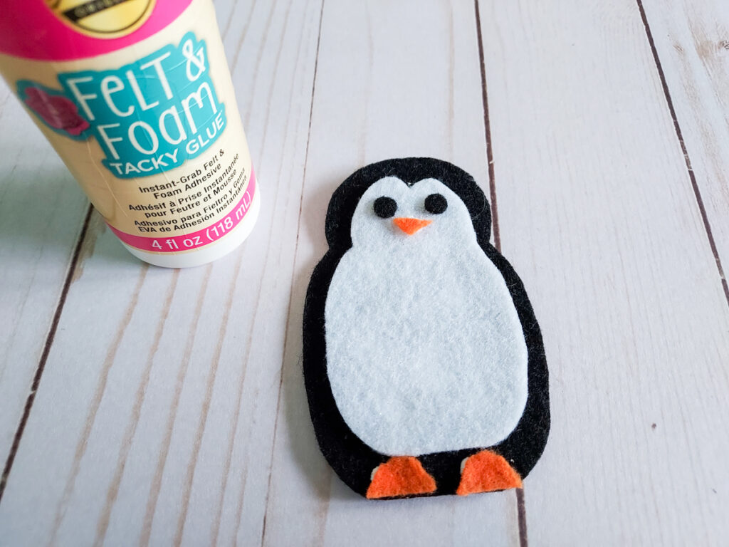 Assembled felt penguin craft. Simple penguin without accessories added yet.