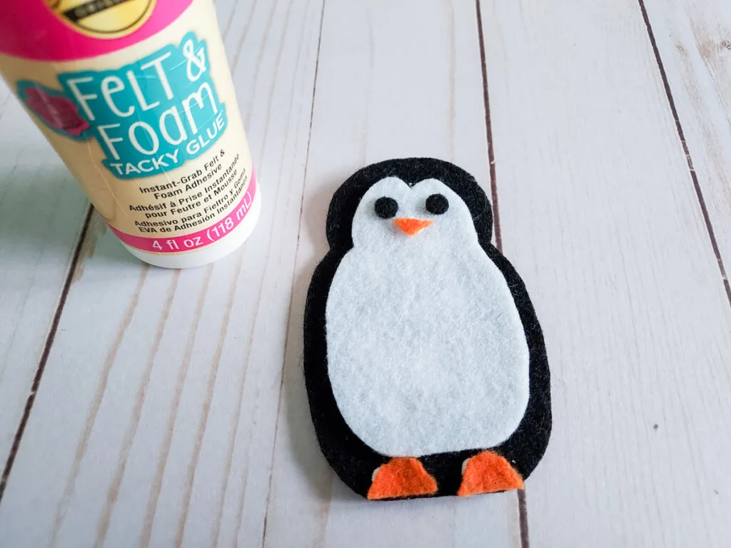 Assembled felt penguin craft. Simple penguin without accessories added yet.