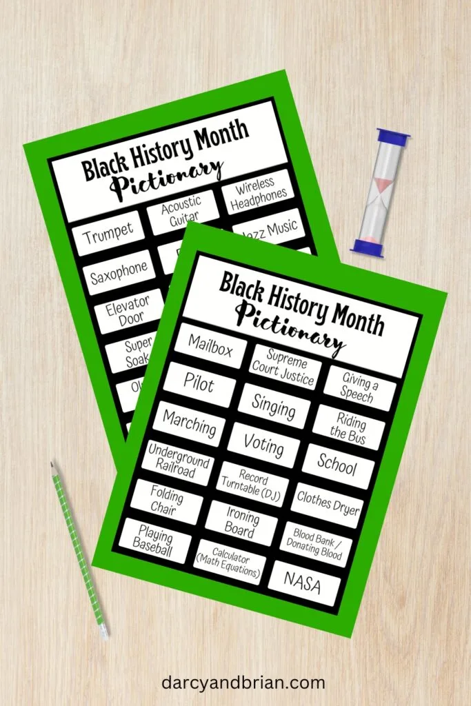 Mockup of Black History Month Pictionary printable word list. Pencil and sand timer are laying near the pages.
