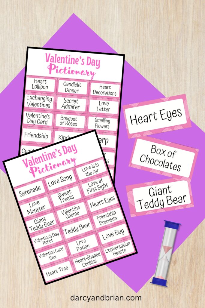 Digital mockup of two Valentine's Day Pictionary word list pages and a couple individual word cards next to a sand timer.