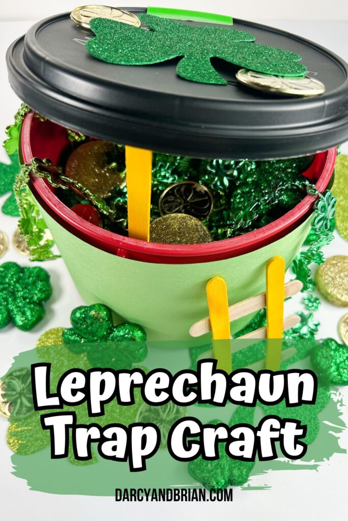 Shamrock decorated leprechaun trap made using an empty plastic coffee container.