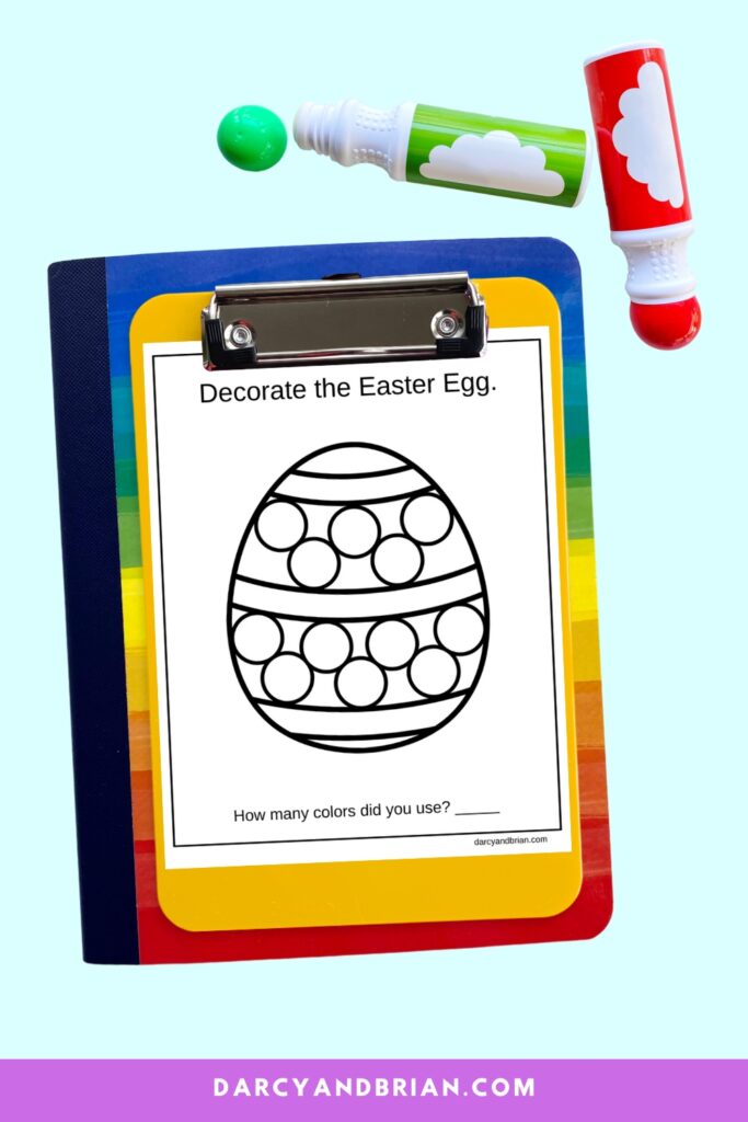 Easter egg do a dot worksheet on a clipboard next to green and red dot markers.