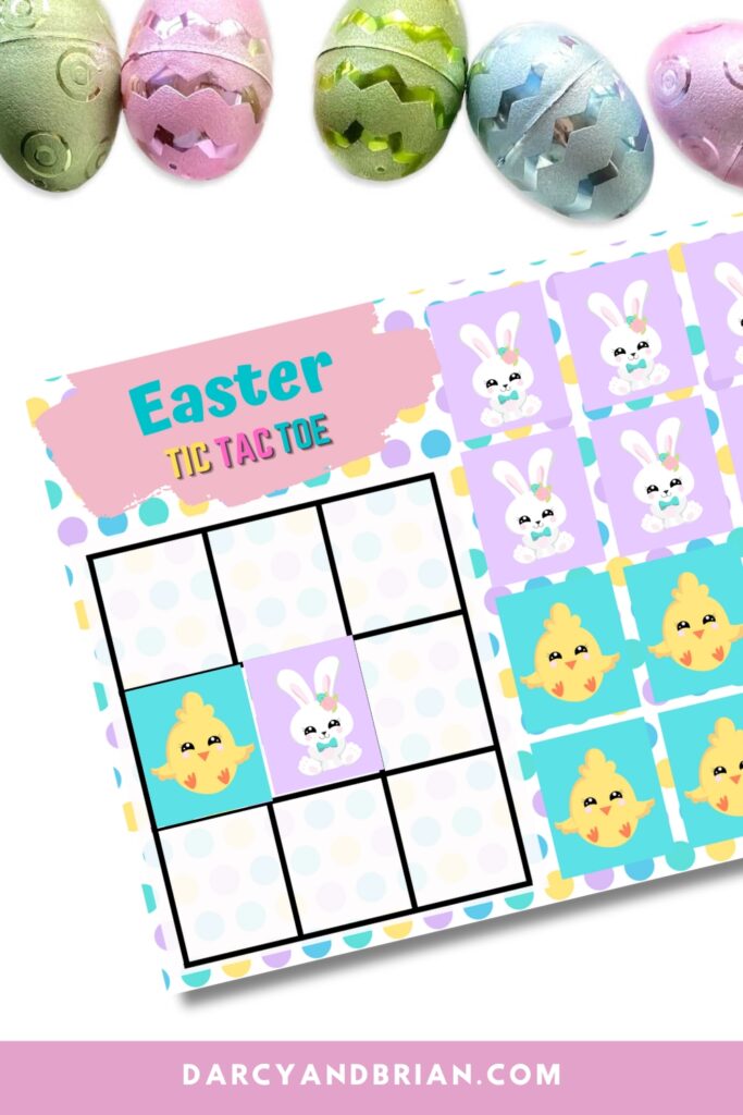 Close up view of one Easter themed tic tac toe game board with baby chick and cute bunny tokens on it.