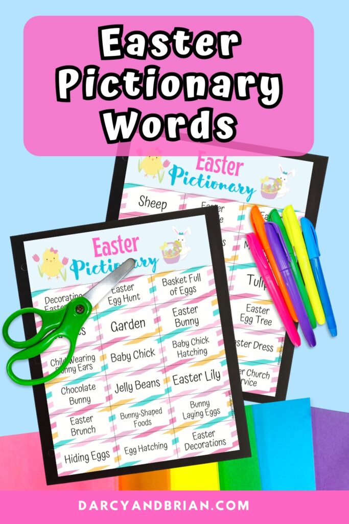 Mockup of printable Easter themed Pictionary game words laying on top of colorful construction paper. Pair of green handled scissors and markers laying over the pages. Name of game is at the top on a pink box.