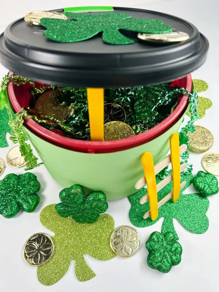 Completed trap for leprechauns made using a plastic bucket like container with a lid.