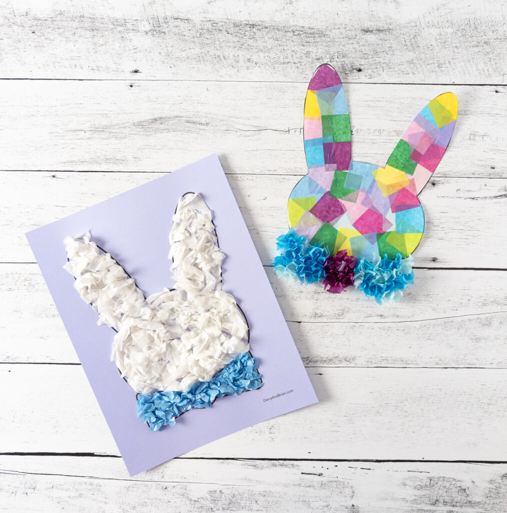 Two completed Easter bunny head crafts made with tissue paper.