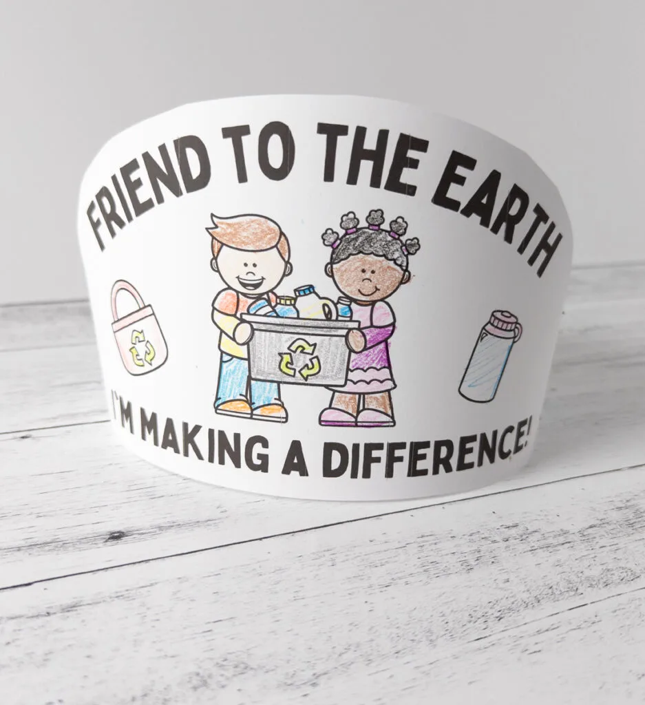Printable paper headband craft showing kids recycling and a message about making a difference.