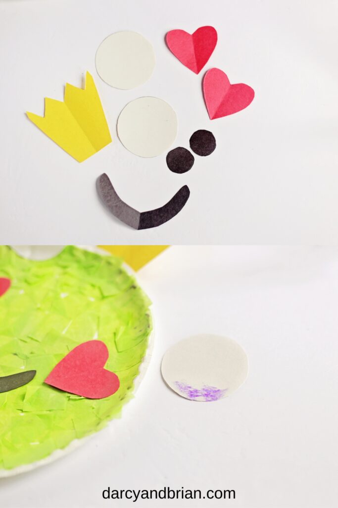 Top photo shows the features (crown, mouth, eyes, hearts) cut out of construction paper. The bottom photo shows the side of the paper plate and where to glue the eyeball on.