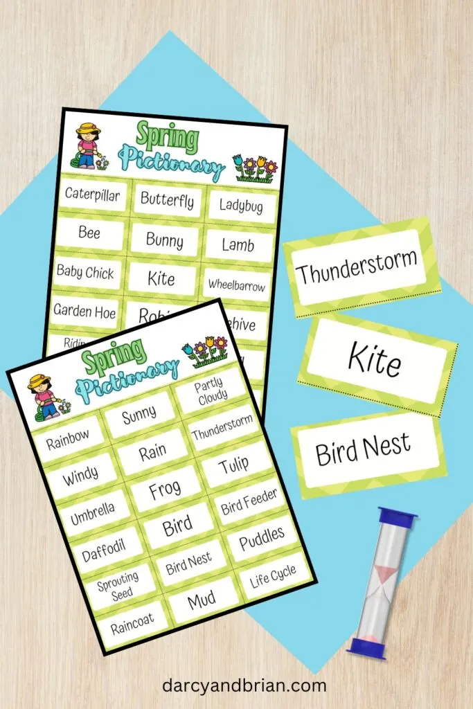 Preview of two pages of drawing prompts for spring draw and guess game. Three of the word cards next to them and a sand timer. Printable game cards say thunderstorm, kite, and bird nest.