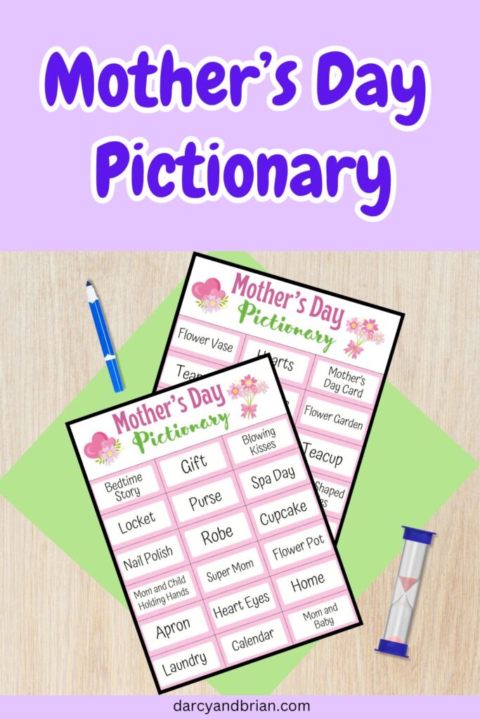 Two pages of Pictionary word cards overlapping on a green paper on a desk. Marker and sand timer laying next to the pages. At the top is dark purple text outlined in white that says Mother's Day Pictionary on a light purple background.