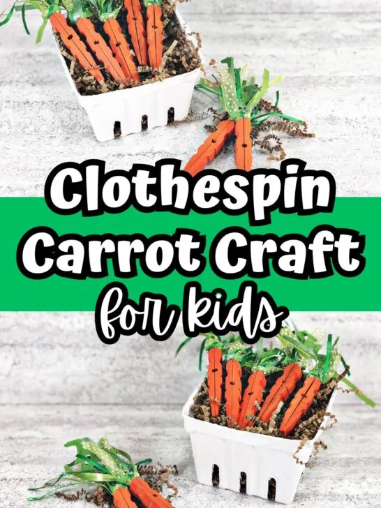 Cute carrots made out of painted clothespins laying in a white veggie box filled with brown crinkle paper shreds.