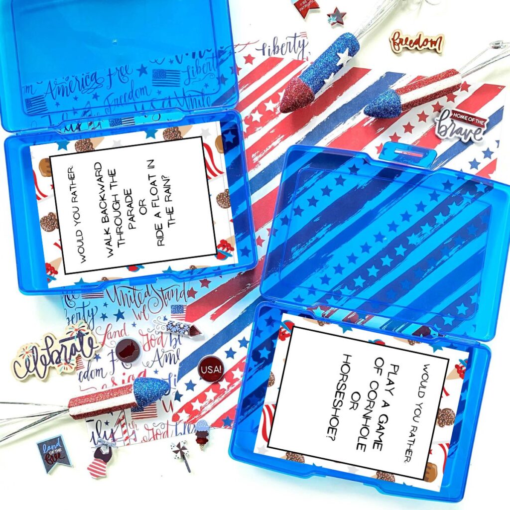 Blue task boxes with 4th of July would you rather? cards inside. Table is decorated with red, white, and blue mini rockets, pins, and paper.